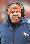  ?? RON CHENOY/USA TODAY SPORTS ?? Broncos coach Sean Payton looks on during a game against the New England Patriots on Dec. 24 in Denver.