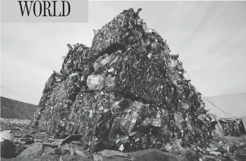  ?? SERGEI GRITS / THE ASSOCIATED PRESS ?? A global study has found that production of plastic and the hard-to-breakdown synthetic waste is soaring in huge numbers. The study, headed by a University of California, Santa Barbara industrial ecologist, says that since 1950 the industry has made...