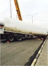  ??  ?? A truck transporti­ng nitrogen pictured after being involved in an accident near North Shuaiba Port’s gate.