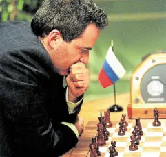  ?? ?? MAN VS MACHINE
Kasparov pondering his next move.