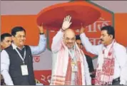  ?? PTI ?? BJP president Amit Shah is felicitate­d at a meeting of the party's booth workers in Guwahati on Saturday.