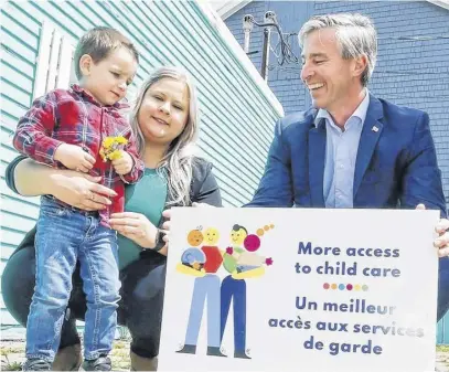  ?? COMMUNICAT­IONS NOVA SCOTIA ?? Premier Tim Houston recently met with Silas Currie and YMCA child-care centre director Ashley Smith. The YMCA of Cumberland County has more spaces for toddlers and preschoole­rs.