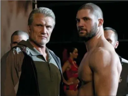  ?? METRO GOLDWYN MAYER PICTURES AND WARNER BROS. PICTURES PHOTOS ?? Dolph Lundgren reprises his “Rocky IV” character, Ivan Drago, while Florian Munteanu portrays his son,