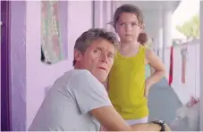  ??  ?? Motel manager Bobby ( Willem Dafoe) is the closest thing Moonee ( Brooklynn Prince) has to a positive role model in “The Florida Project.”