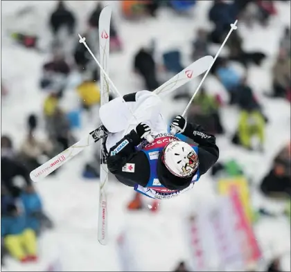  ?? — GETTY IMAGES ?? Olympic silver medallist Mikael Kingsbury of Sainte-Agathe-des-Monts, Que., earned a bronze medal on Saturday during the men’s portion of moguls World Cup event in Inawashiro, Japan.