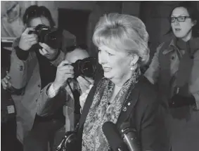 ?? ADRIAN WYLD/ THE CANADIAN PRESS ?? Sen. Pamela Wallin arrives on Parliament Hill in Ottawa on Wednesday ready for battle on charges of improper spending for travel over the past few years..