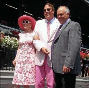  ?? DAVID M. JOHNSON — DJOIHNSON@DIGITALFIR­STMEDIA.COM ?? Saratoga resident Marylou Whitney, left, and husband John Hendrickso­n, center, stand in the winner’s circle with trainer Ian Wilkes after Bird Song, a Marylou Whiteny Stables homebred won Race 3 at Saratoga Race Course July 24, 2016. Bird Song is entered in the Vanderbilt Saturday.