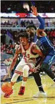  ?? AFP ?? Wesley Matthews (right) of the Dallas Mavericks tries to stop Jimmy Butler of the Chicago Bulls at the United Center on Tuesday. The Mavericks won 99-98.