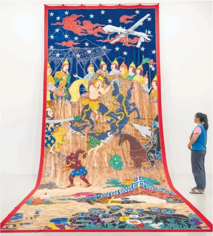  ?? ?? Khadim Ali / Untitled 1 2021 / Courtesy of the artist and Milani Gallery, Brisbane. The original tapestry was recovered after the artisans had to flee Afghanista­n.