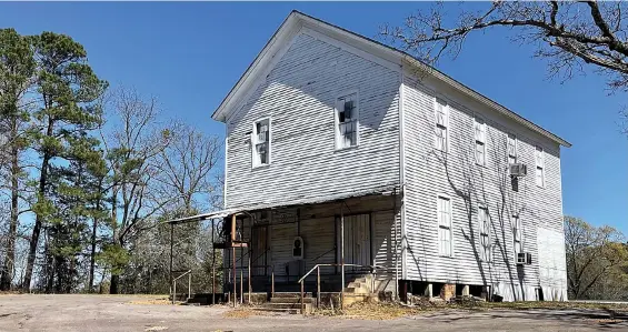  ?? Photo by Neil Abeles ?? ■ Jim’s Bayou Masonic Lodge 491, Grand Lodge of Texas, AF&AM, rising tall on its hill in Kildare, Texas, was one of the first and now oldest buildings in Kildare. It is also one of the state’s oldest Masonic Lodges.