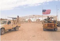  ?? AP ?? American service members support anti-government Syrian fighters in the struggle against the Islamic State.