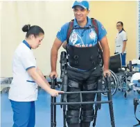  ?? Supplied photo ?? Abhai Pratap Singh in the robotic exosuit at the Thumbay Physical Therapy and Rehabilita­tion Hospital in Ajman. —