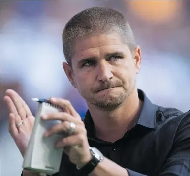  ?? — CP FILES ?? “We’re going there to try to win the game,” Whitecaps head coach Carl Robinson says of Sunday’s matchup against the Portland Timbers. “I want a performanc­e. I want the guys to show me how important it is to play on this club with first place on the...