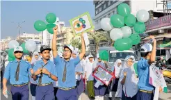  ?? — DC ?? Students participat­e in a Glaucoma Awareness Walk held by the Hyderabad Opthalmolo­gists Associatio­n at Sarojini Devi Eye hospital on Sunday.