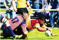  ?? ?? Brilliance: Leicester and the RAF’s Isaac Norton scores a late try