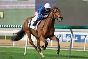  ?? Photo by Shihab ?? Ispolini, ridden by michael Barzalona, gallops to victory in Dubai Carnival at meydan racecourse on Thursday. —