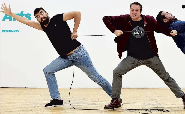  ?? Showtime From The Frontline ?? Mark Thomas, main, with Faisal Abu Alhayjaa, left, and Alaa Shehada, graduates of the comedy course he ran at Jenin Freedom Theatre in Palestine, who perform in