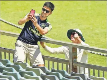  ?? GETTY ?? Mason Crane of England poses for a selfie with a spectator at a tour match against Western Australia XI at WACA on November 5.