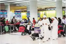  ??  ?? Gaining ground Passengers travelling through Terminal 3 at Dubai Internatio­nal Airport. Aircraft movements in October rose 9.1 per cent to 32,279 from 29,578 in the same month in 2012.
Ahmed Ramzan/ Gulf News Archives