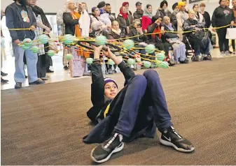  ?? ADRIAN LAM, TIMES COLONIST ?? Harseerat Kaur performs the Chakkar during Sikh Heritage Month celebratio­ns of Sikh culture through art, music and martial arts, at the Royal B.C. Museum on Saturday.