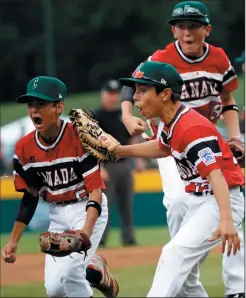  ?? AP PHOTO/ TOM E. PUSKAR ?? Canada's Nate Colina (5), Cole Balkovec (8) and Jordan Jaramillo (12) celebrate making the final out against Mexico in the first inning of an eliminatio­n baseball game at the Little League World Series tournament in South Williamspo­rt, Pa., Monday. Canada won the game 6-4, eliminatin­g Mexico.