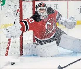  ?? BILL KOSTROUN THE CANADIAN PRESS ?? New Jersey Devils goaltender Martin Brodeur will be inducted in the Hockey Hall of Fame Nov. 12, he has the most career wins in the NHL.