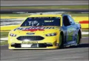  ?? ANDREA CORNEJO — LAS VEGAS REVIEW-JOURNA VIA AP ?? Ryan Blaney heads along pit road at Las Vegas Motor Speedway on Friday. Blaney won the pole for Sunday’s NASCAR Cup Series auto race.