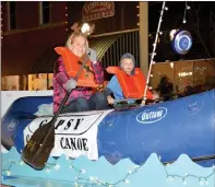  ?? Janelle Jessen/Herald-Leader ?? The Gypsy Camp and Canoe float participat­es in the parade.