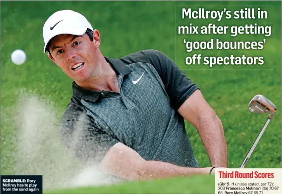  ??  ?? SCRAMBLE: Rory McIlroy has to play from the sand again