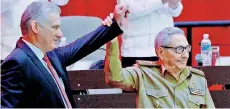  ?? — AFP photo ?? Castro (right) raising Diaz-Canel’s hand as he was elected as the new First Secretary during the 8th Congress of the Cuban Communist Party at the Convention Palace in Havana,