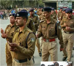  ??  ?? Jawans of CRPF 31 battalion participat­e in a candleligh­t march in New Delhi on Monday to pay tribute to their slain colleague Vasanth Kumar who lost his life in Pulwama terror attack. Doctors and nurses ( right) pay homage to the martyrs of Pulwama attack.— BIPLAB BANERJEE , PTI