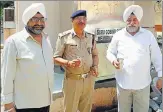  ?? HT PHOTO ?? ▪ President of Shri Guru Singh Sabha Sardar Joginder Singh (right) with DIG (Jails) BR Verma in front of the newly gifted cooler in Naini Central Jail.