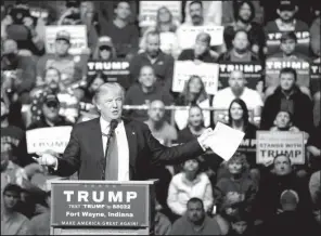  ?? AP/ DARRON CUMMINGS ?? Republican presidenti­al candidate Donald Trump speaks during a campaign stop at the Allen County War Memorial Coliseum on Sunday in Fort Wayne, Ind.