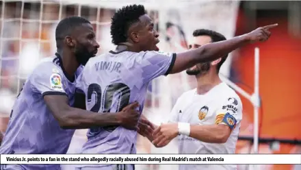  ?? ?? Vinícius Jr. points to a fan in the stand who allegedly racially abused him during Real Madrid's match at Valencia