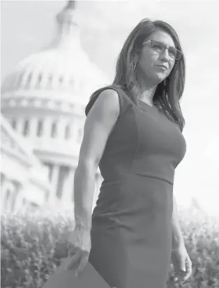  ?? ALEX WONG/GETTY ?? U.S. Rep. Lauren Boebert, R-Colo., waits for the beginning of a news conference July 1 in front of the U.S. Capitol in Washington, D.C. Boebert is a member of the House Freedom Caucus.