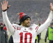  ?? AP FILE ?? IN LIMBO: San Francisco 49ers’ quarterbac­k Jimmy Garoppolo celebrates after winning an NFC Divisional playoff game on Jan. 22 in Green Bay, Wis.