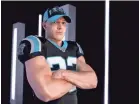  ?? COURTESY OF NEW ERA ?? Carolina wide receiver Christian McCaffrey wears a New Era cap celebratin­g the Panthers’ first year in the league.