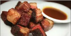  ?? STAFF ARCHIVES ?? Smoking Pig BBQ is serving its popular burnt ends and other dishes for Sharks fans at SAP Center.