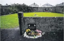  ?? CLODAGH KILCOYNE • REUTERS ?? The Tuam graveyard in Ireland, where the bodies of 796 babies were uncovered at the site of a former Catholic home for unmarried mothers and their children.