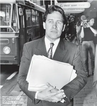  ??  ?? Peters takes a walk after storming out of National Party headquarte­rs in Wellington in March 1993.