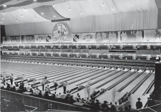  ?? DISPATCH FILE ?? The ABC tournament in 1950 was billed as the world’s largest athletic event in terms of number of participan­ts. Prizes included cash, trophies, diamond-studded medals, watches and clocks. Note the image of Christophe­r Columbus above the lanes.