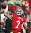  ?? TONY AVELAR — THE ASSOCIATED PRESS FILE ?? Colin Kaepernick warms up for the 49ers before a game against the Seahawks.