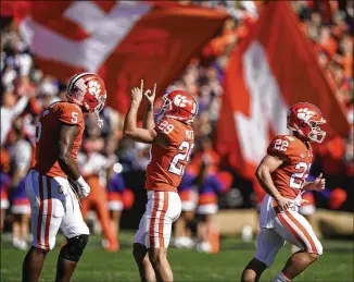  ?? BRYNN ANDERSON/ASSOCIATED PRESS ?? Clemson kicker B.T. Potter (29) celebrates a kick during the first half against Wake Forest on Saturday in Clemson, S.C. The Tigers won their 34th straight at home.