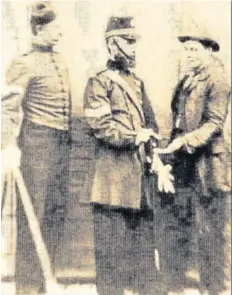  ??  ?? A recruits receives his Queen’s Shilling 1865-1870 Right, soldiers of the 13th LRV in about 1865 – could James Turvey be one of them?