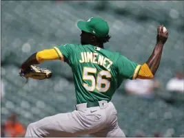  ?? PAUL SANCYA — THE ASSOCIATED PRESS ?? A's relief pitcher Dany Jimenez throws against the Detroit Tigers in the ninth inning in Detroit last Thursday.