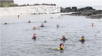  ??  ?? Wick’s Kool Water Swimmers in the town’s North Baths.