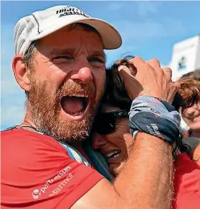  ?? ALLAN URE/PHOTOS4SAL­E.CO.NZ ?? Malcolm Law, runner and fundraiser, completing his High 50 challenge, and feeling the finish-line joy.