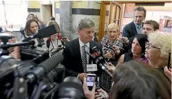  ?? NZ ?? Bill English fronts the media pack, confirming his intention to stand for prime minister.fairfax