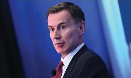  ?? Photograph: Mandel Ngan/AFP/ Getty Images ?? Jeremy Hunt ‘will have been disappoint­ed’ if he was expecting more scope for tax cuts, an analyst said.