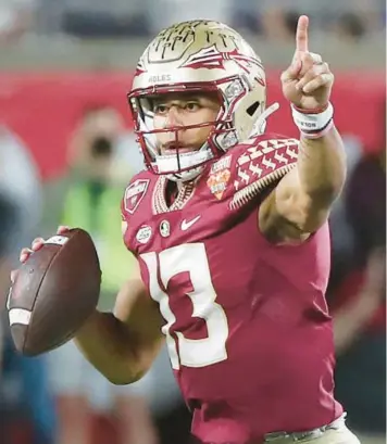  ?? STEPHEN M. DOWELL/ORLANDO SENTINEL ?? As Florida State quarterbac­k Jordan Travis enters his final year, he’s receiving a lot of national attention for his performanc­e in 2022.